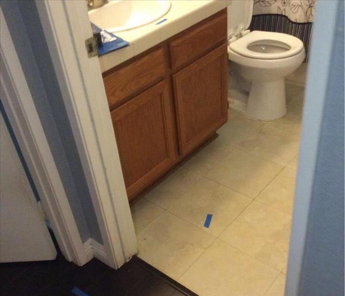 water loss in hall bathroom, floor damaged